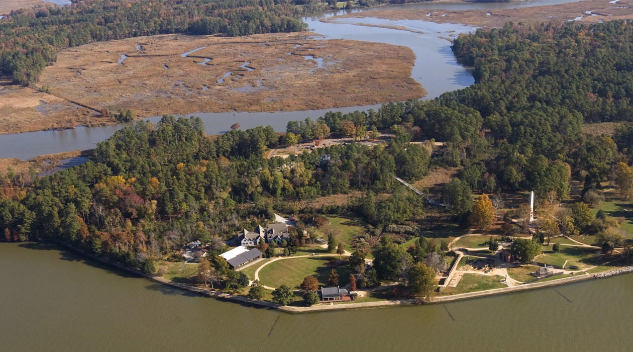 An aerial view of James Island and James Fort. The Jamestown colony was established in Tsenacomoco, the Algonquian name for the Powhatan chiefdom in the tidewater areas of the Chesapeake Bay and later became the Commonwealth of Virginia. / Jamestown Rediscovery