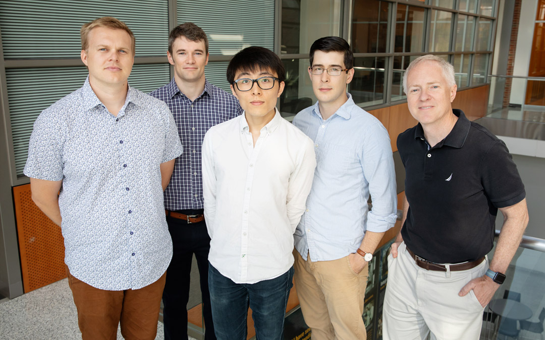 Illinois researchers developed a method to detect cancer markers called microRNA with single-molecule resolution, a technique that could be used for liquid biopsies. From left: postdoctoral researcher Taylor Canady, professor Andrew Smith, graduate student Nantao Li, postdoctoral researcher Lucas Smith and professor Brian Cunningham.
