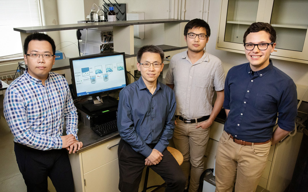 A team including, from left, postdoctoral researcher Ziyuan Song, professor Jianjun Cheng and graduate students Tianrui Xue and Lazaro Pacheco, developed a new method that streamlines the construction of amino acid building blocks that can be used in a multitude of industrial and pharmaceutical applications.
